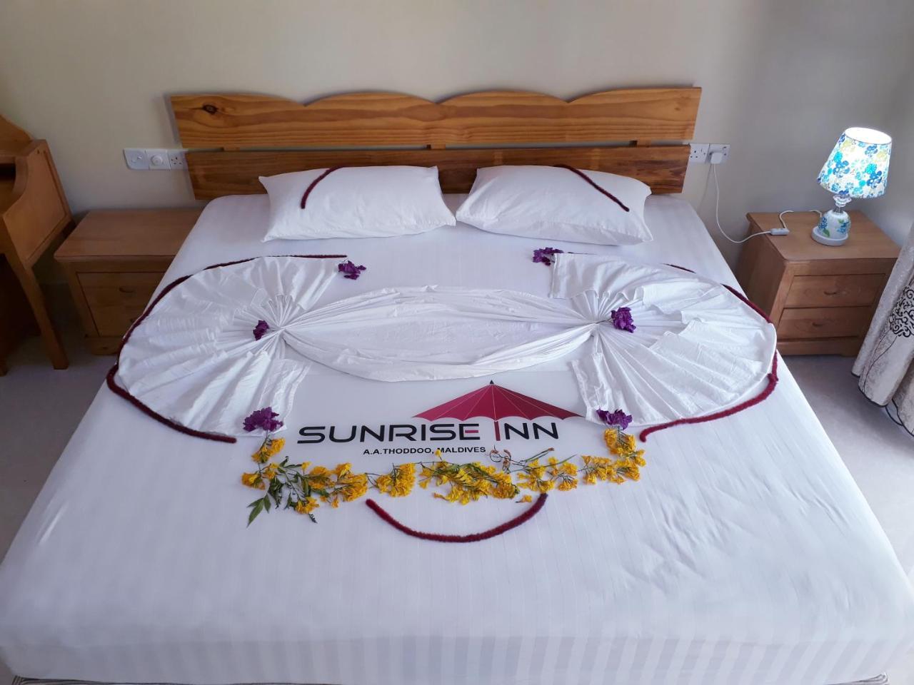 טאודו Sunrise Inn מראה חיצוני תמונה