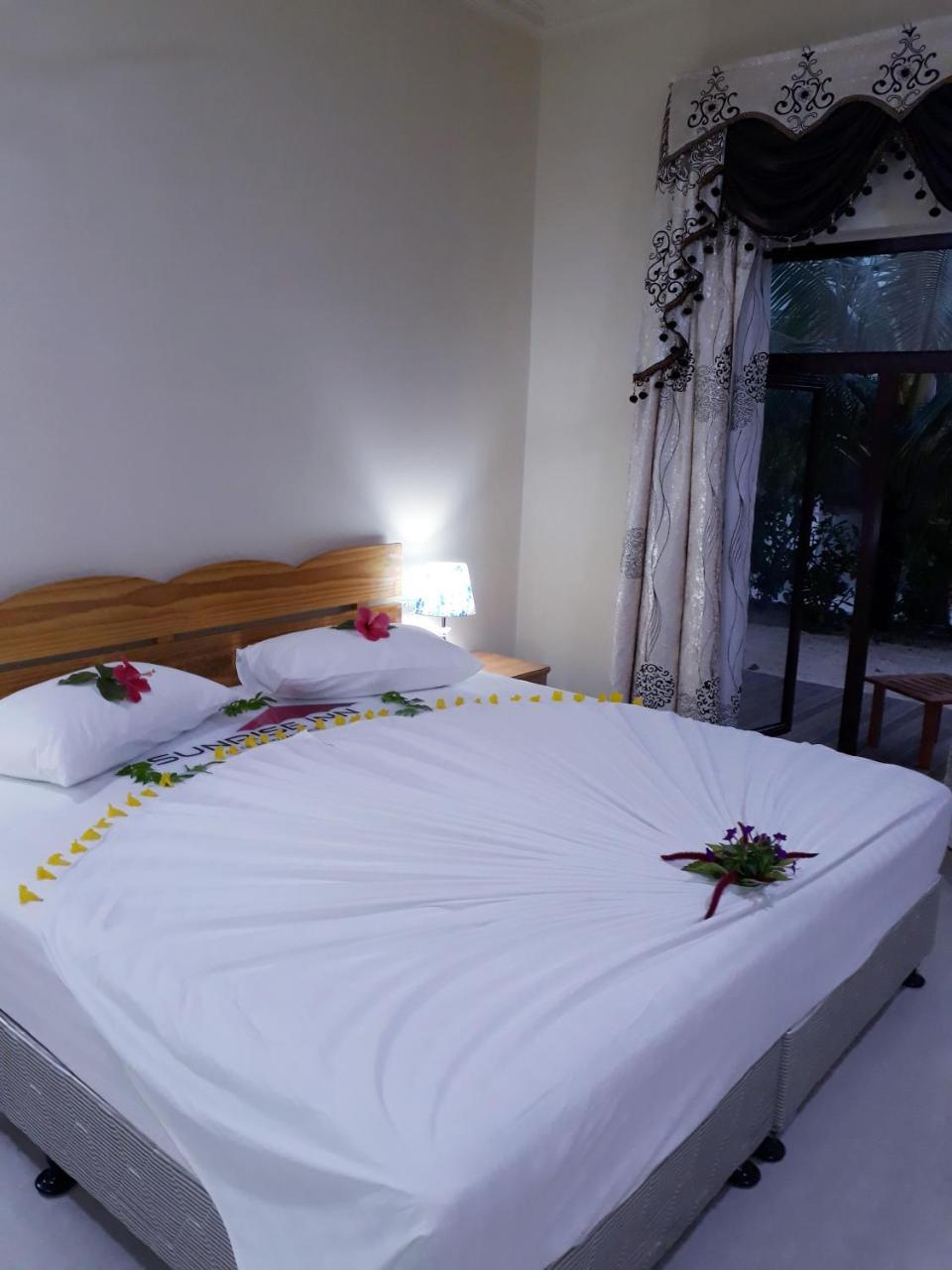טאודו Sunrise Inn מראה חיצוני תמונה